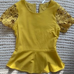 Peplum top in mustard with lace sleeves